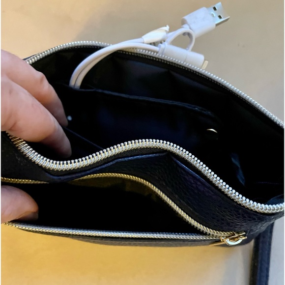 Liz Claiborne wristlet includes detachable cell phone charger cord. - Picture 4 of 4